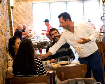 waiter-speaking-with-customers